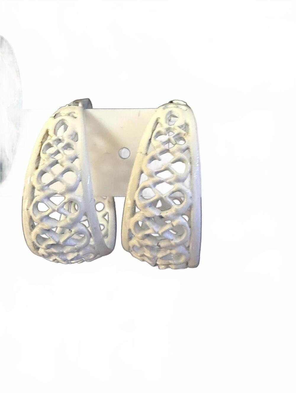 White carved hoop earrings